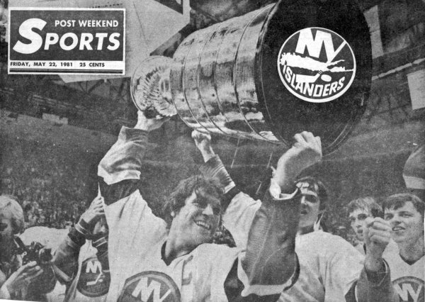 Denis Potvin hoists the cup
